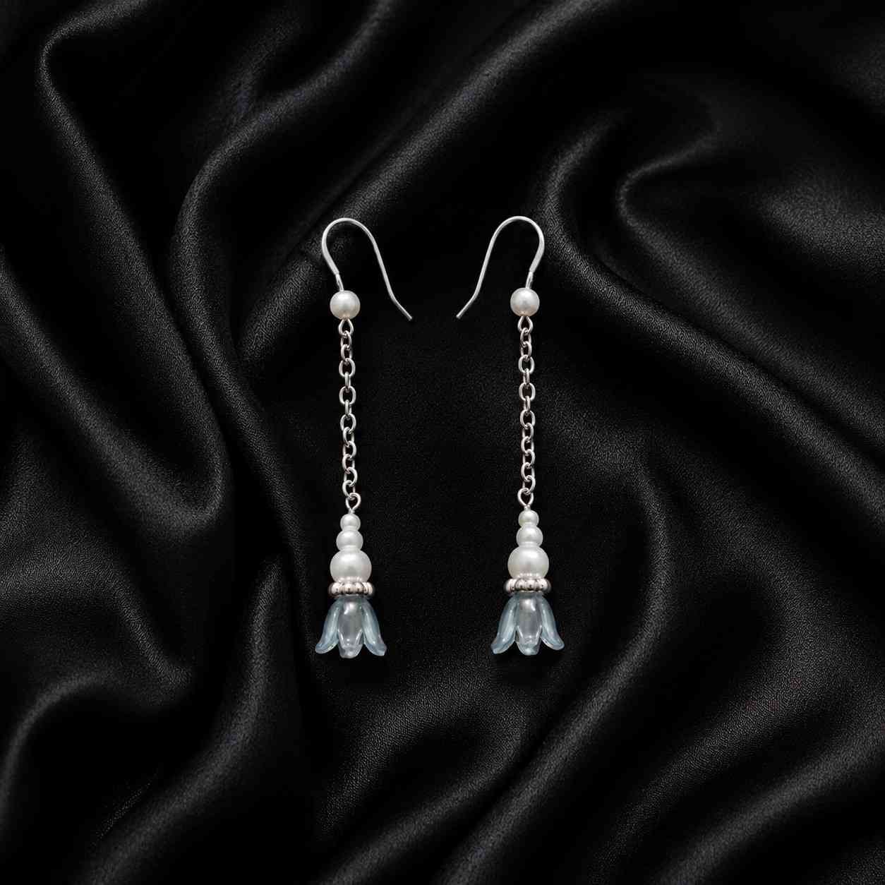 long chain earrings with pearl details