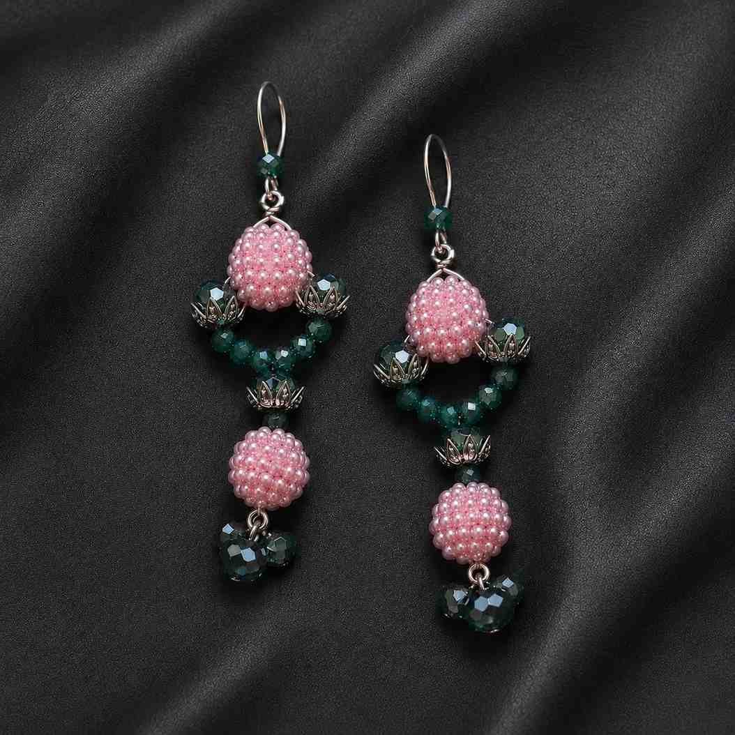 Elegant long crystal earrings worn for festive occasions